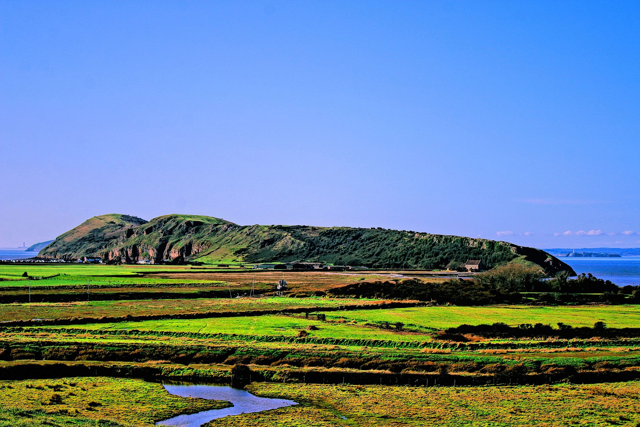 Open field landscape representing rural Nebraska property conditions
