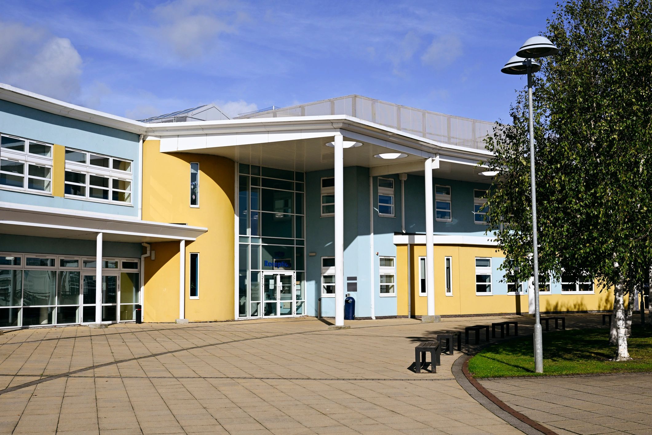 Large institutional building exterior relevant to commercial bird and wildlife control